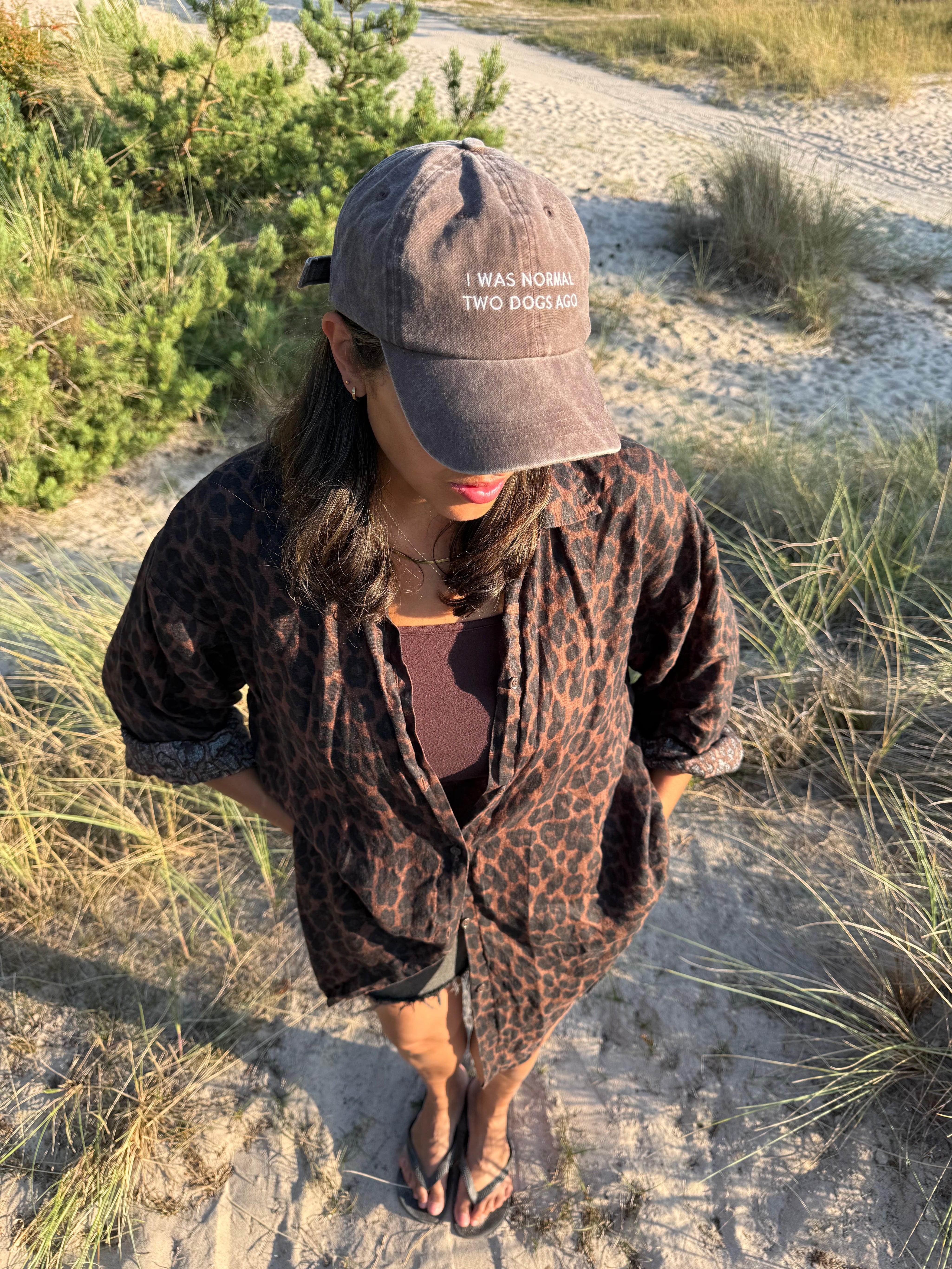 brown-denim-cap-i-was-normal-two-dogs-ago-beach.jpg